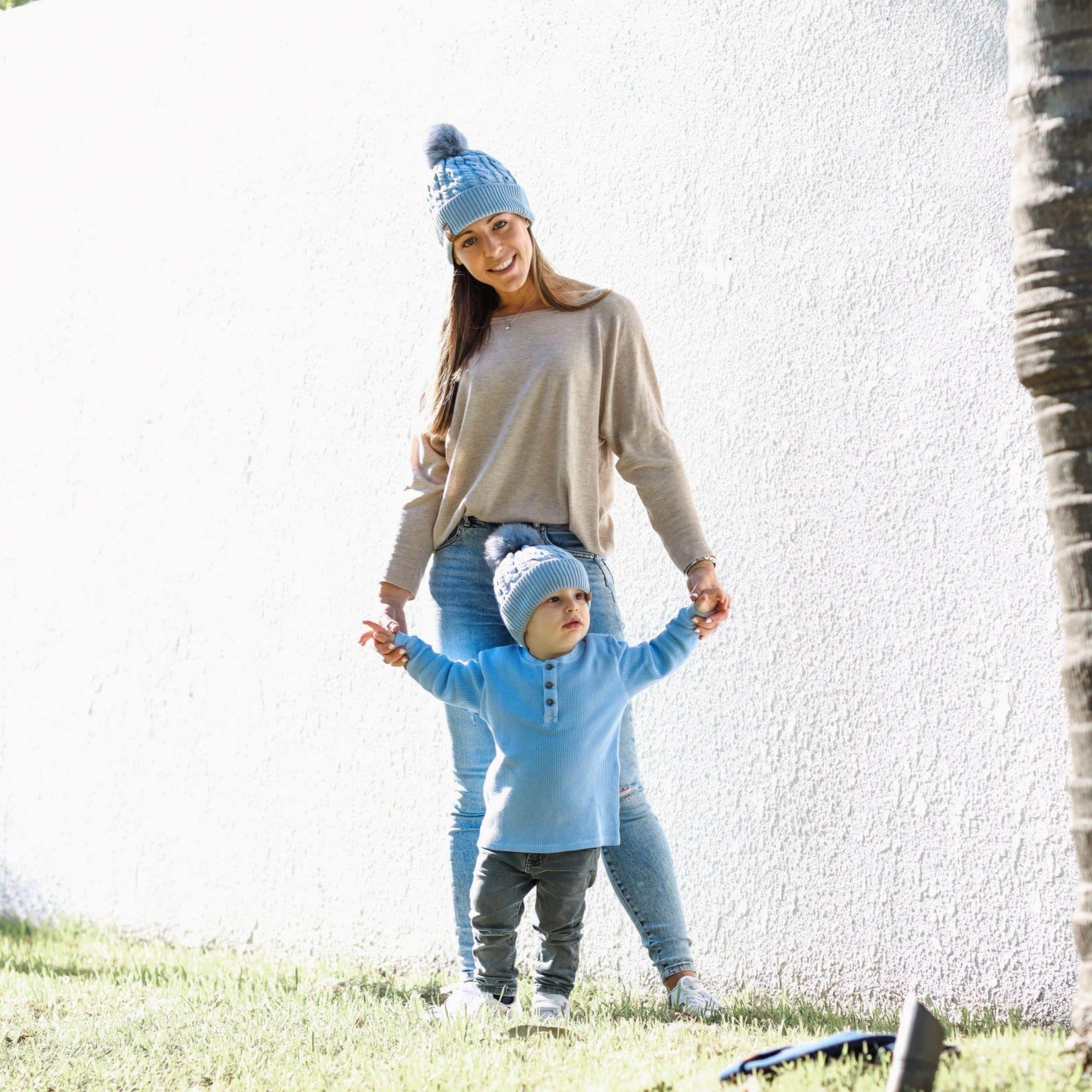 Matching mum and kid blue winter cotton beanie with pom pom. Cubs & Co. Australia.