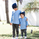 Brothers wearing matching navy winter beanies. Cubs and Co. Australia