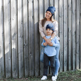 Mum and son wearing matching navy winter beanies. Cubs and Co. Australia