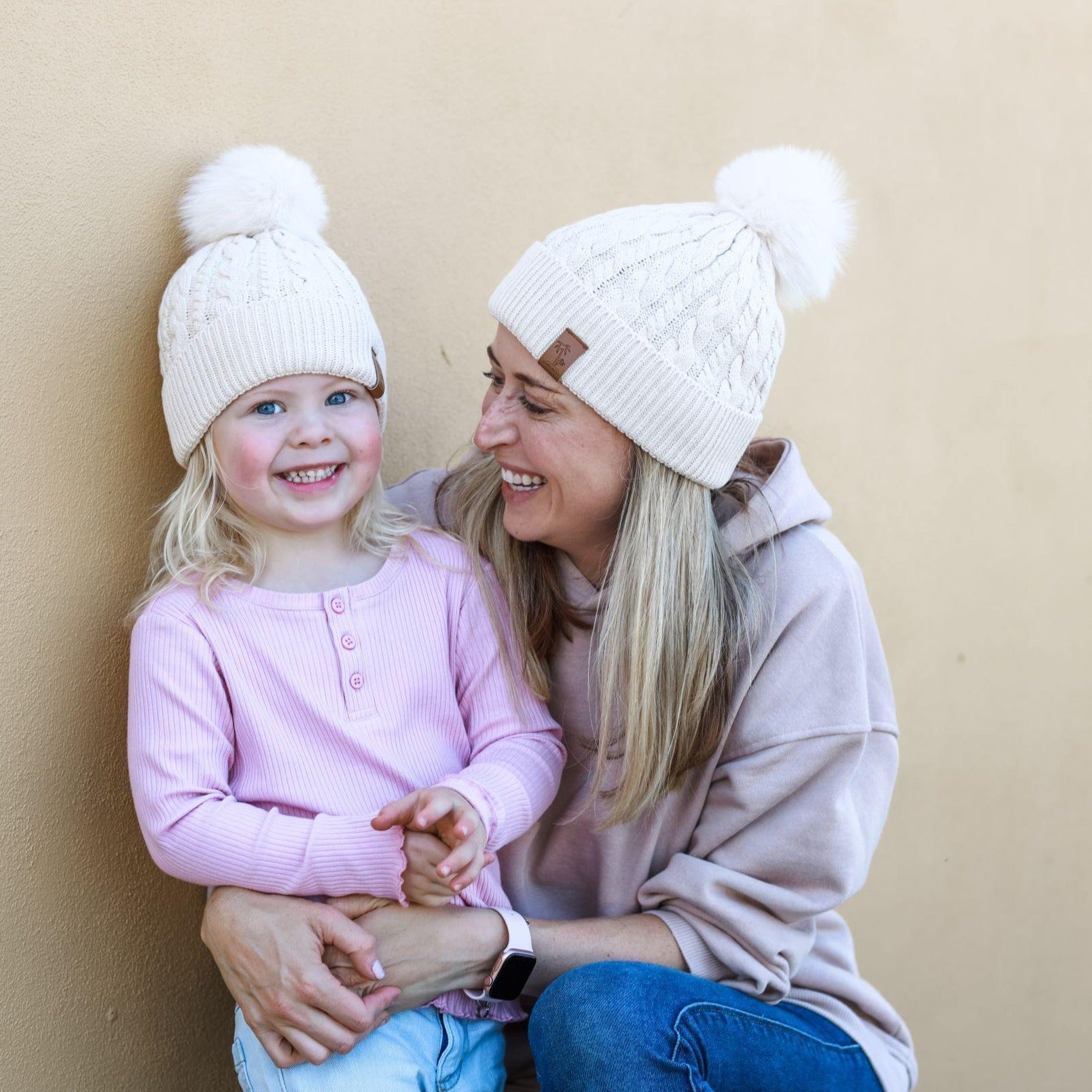 Matching mum and daughter cream winter cotton beanie with pom pom. Cubs & Co. Australia.