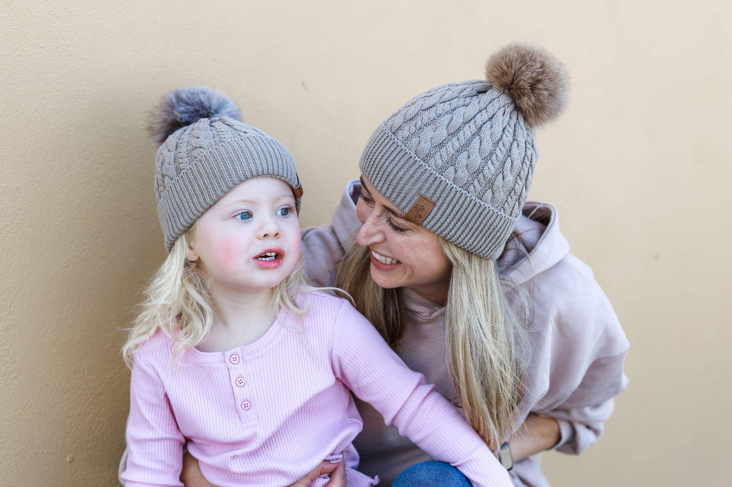 Matching mum and daughter brown winter cotton beanie with pom pom. Cubs & Co. Australia.
