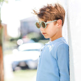 Boy wearing kids green olive sunglasses with UV protection. Cubs & Co. Australia