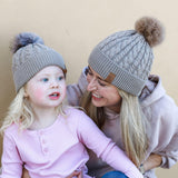 mum and child wearing pom pom persoanlised beanie, cubs and co sydney