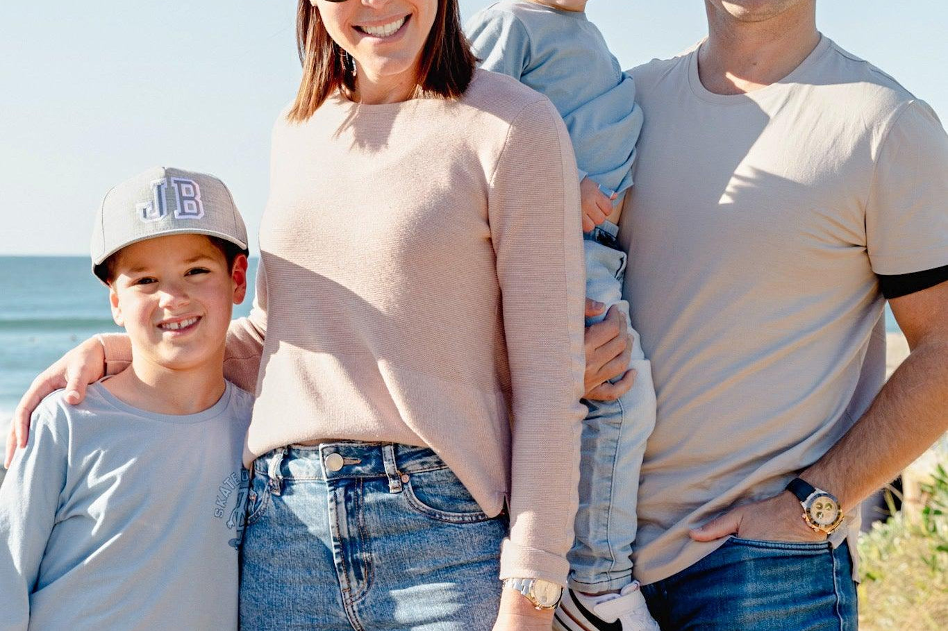 Family wearing matching personalised grey baseball caps with their initials. Cubs & Co. Australia.