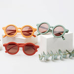 Kids yellow, green, orange sunglasses with UV400 protection. Cubs & Co. Australia.
